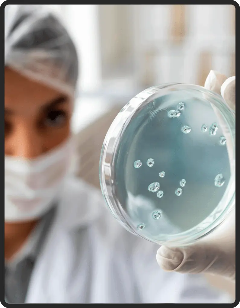 image of doctor examining microbes 